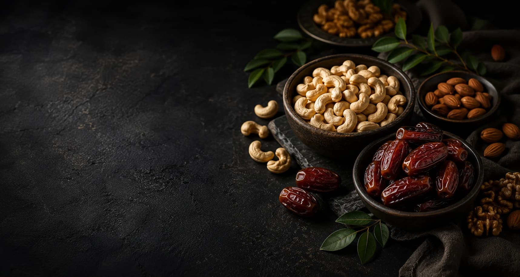 Bowls of cashews and dates